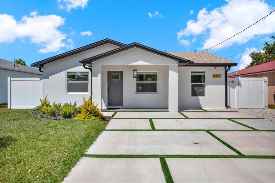 Located just a few blocks from Raymond James Stadium, This beautiful converted single family home is a rare opportunity to own a fully high-performing short- term rental property in the heart of Tampa. Currently operating on Airbnb and generating over 36K in only 7 months last year. This  property offers immediate passive income with strong future appreciation potential. The home has been thoughtfully divided into three separate units, each with it's own private entrance. Main unit offers a living room, dining room, 2 bedrooms, 1 bathroom, laundry room, spacious kitchen and a beautiful back porch overlooking the private fully fenced back yard. Second unit comfortable 1 bedroom, 1 bathroom fully furnished. Third unit 1 Bedroom, 1 bathroom also fully furnished. The property attract high occupancy thanks to the unbeatable location - just minutes to Downtown Tampa, Riverwalks, Midtown and all mayor attractions in Tampa. Turn Key Investment the house was built in 1983  but was completely renovated from top to bottom  in 2025 adding over 1000 sqft to the house, new plumbing, electrical, AC, roof, Insullation,  floors, bathrooms, kitchen, fence, driveway etc.This is a standout opportunity in one of Tampa's must dynamic neighborhoods.