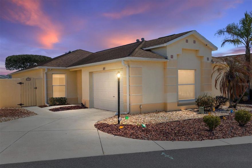 NO BOND! Discover this charming 2-bedroom, 2-bath SAN LUCAS MODEL Courtyard Villa in the sought-after Villa of San Leandro in the Village of Santiago—a prime location in the heart of The Villages, close to everything that makes the lifestyle so desirable.
This block and stucco home has an updated ROOF 2018, and offers the privacy and low-maintenance living Courtyard Villas are known for, with a spacious layout and VAULTED CEILINGS THROUGHOUT that enhance the open feel. The home features an GLASS ENCLOSED LANAI, perfect for year-round enjoyment, relaxing mornings, or entertaining guests. The kitchen is equipped with GAS APPLIANCES and a NEW DISHWASHER, and a NEWER REFRIGERATOR offering both efficiency and convenience.
Additional updates and features include a TURN-KEY PACKAGE and a Gas GOLF CART (2014). LAMINATE FLOORING THROUGHOUT  the main living areas and the primary bedroom. THE guest bedroom is like a second suite, providing comfort and functionality for visitors. The Beauregard model is known for its smart use of space, private outdoor courtyard, and easy indoor-outdoor flow—ideal for full-time living or seasonal enjoyment.
Located just minutes from Spanish Springs Town Square, residents enjoy quick access to nightly entertainment, shopping, restaurants, medical facilities, and community activities. Nearby recreation centers, golf courses, and pools make it easy to embrace The Villages lifestyle, whether you prefer golf, social clubs, fitness, or dining out. Major shopping corridors and everyday conveniences are also just a short golf cart ride away.
If you’re searching for a NO BOND Courtyard Villa in The Villages, with proximity to amenities, a desirable model, and key updates already in place, this home offers an exceptional opportunity to enjoy comfort, location, and lifestyle all in one.