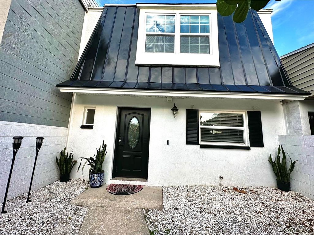 Photo of 10021 N 53rd Street, Temple Terrace, FL 33617 (MLS # TB8474478)