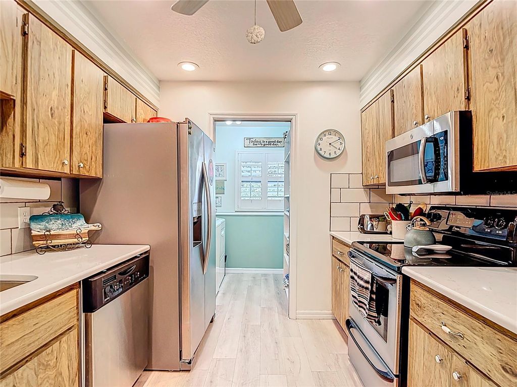 Photo of 7837 Radcliffe Circle #105, Port Richey, FL 34668 (MLS # W7878808)