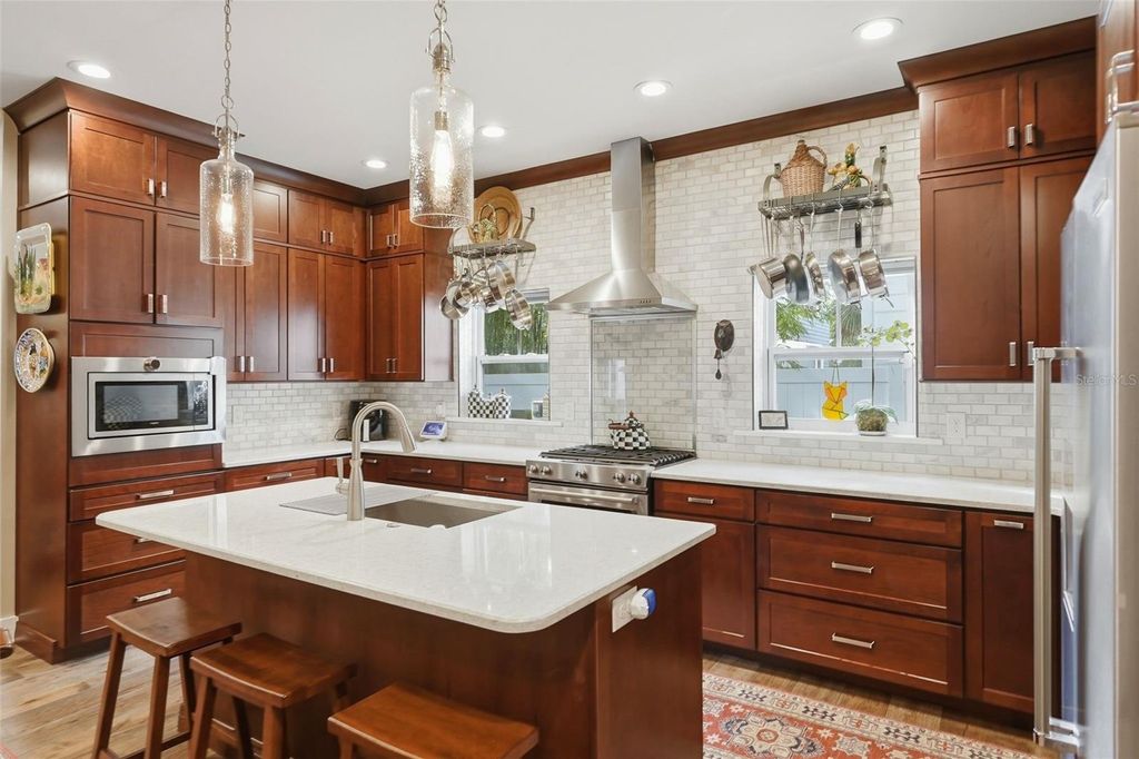 Photo of 430 11th Avenue NE, St Petersburg, FL 33701 (MLS # TB8497718)