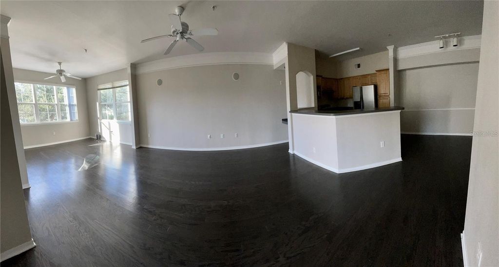Photo of 6412 Queens Borough Avenue #213, Orlando, FL 32835 (MLS # O6394312)