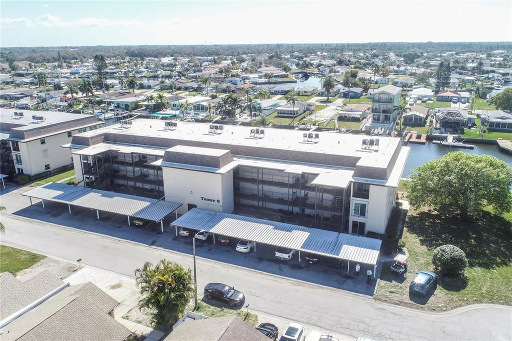 Photo of 4452 Garnet Drive #302, New Port Richey, FL 34652 (MLS # W7876837)