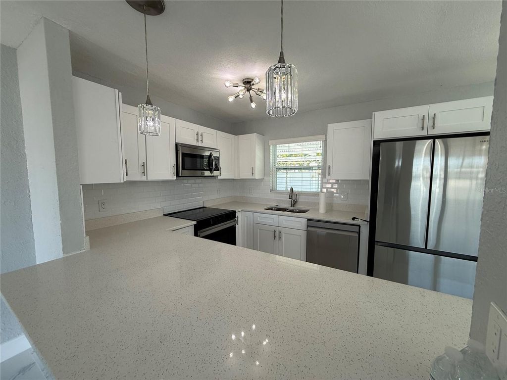 Photo of 450 82nd Avenue, St Pete Beach, FL 33706 (MLS # TB8476600)