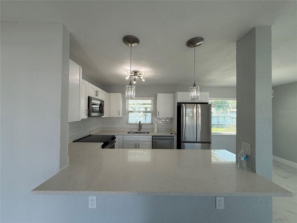 Photo of 450 82nd Avenue, St Pete Beach, FL 33706 (MLS # TB8476600)