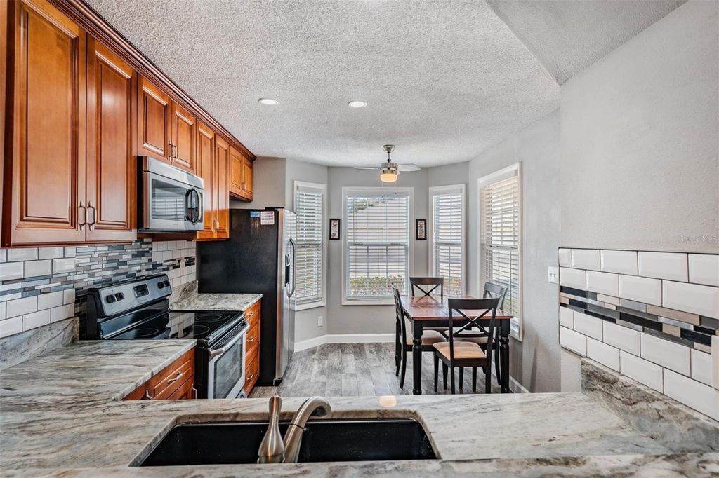 Photo of 11308 Versailles Lane #C, Port Richey, FL 34668 (MLS # W7883773)