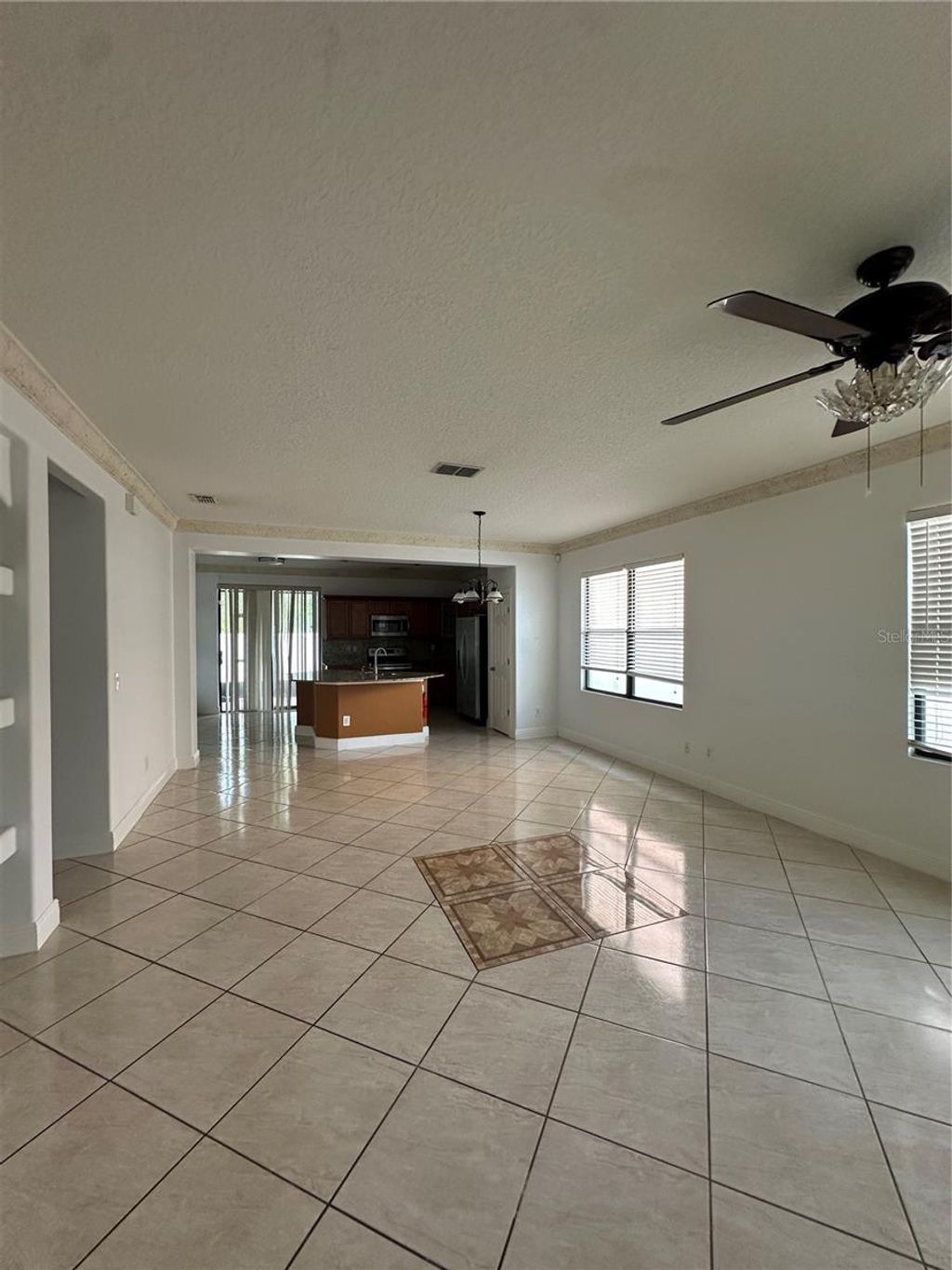 Photo of 9097 Venezia Plantation Drive, Orlando, FL 32829 (MLS # O6423430)