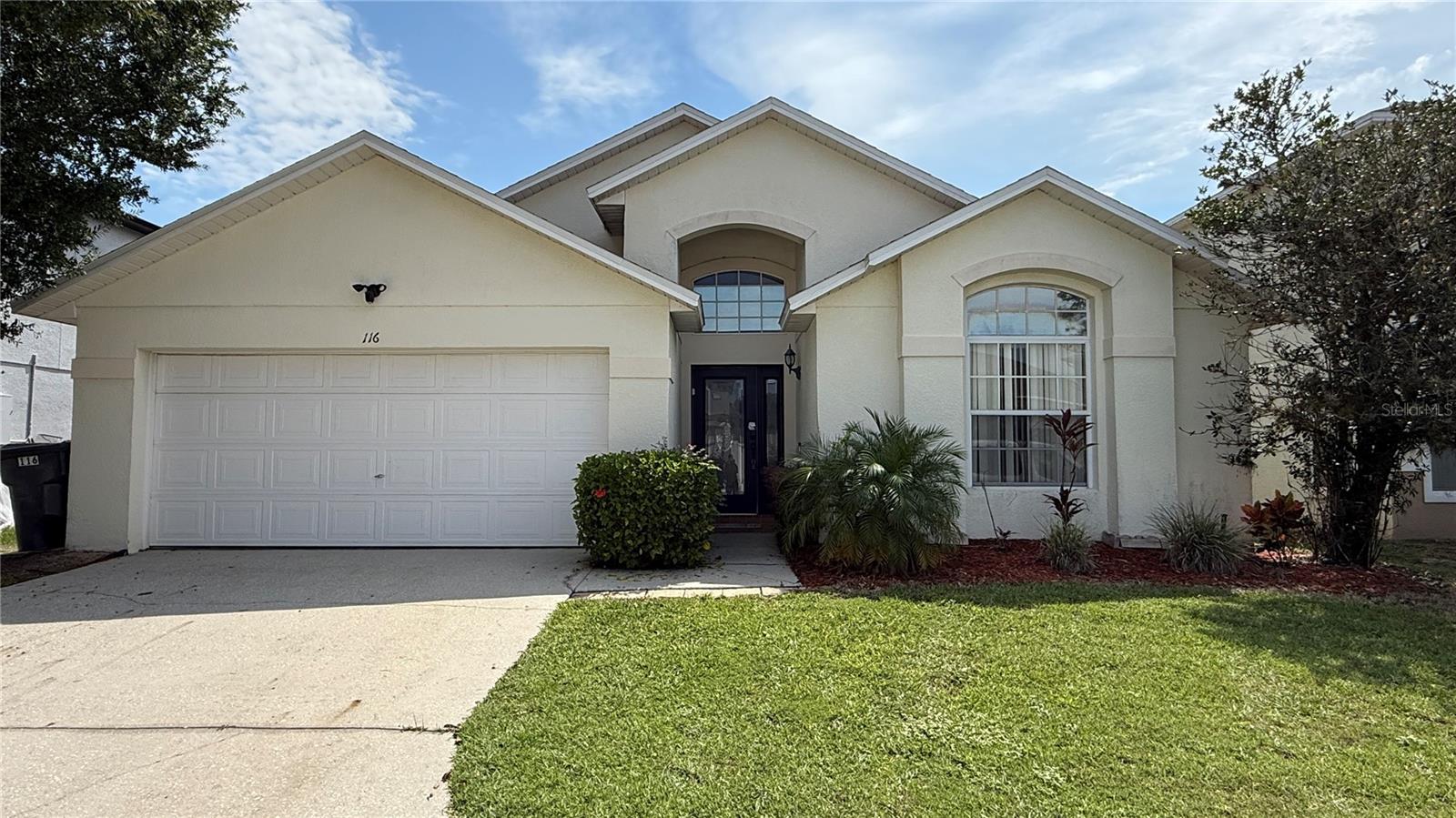 Location is Everything in the Sought-After Windwood Bay Community! This beautifully maintained 4-bedroom, 3-bathroom, 2-car garage single-family home with a private pool and spa offers the perfect blend of comfort, style, and convenience. With no rear neighbors and lush, manicured landscaping, you’ll enjoy both privacy and curb appeal. Pool maintenance is included, so you can relax and enjoy! Inside, soaring vaulted ceilings and thoughtful architectural details create a bright, open feel. The inviting floor plan begins with a spacious entryway that flows seamlessly into the kitchen and family room combo. The eat-in kitchen is a delight, featuring stainless steel appliances, a breakfast bar, and a walk-in pantry. The generously sized master suite opens directly to the pool area and features a spa-like ensuite with dual sinks, a soaking tub, and a separate walk-in shower. Tile flooring in the living and wet areas and vinyl plank flooring in the bedrooms. Step outside to your backyard retreat, complete with a covered, screened-in lanai and sparkling pool with spa—ideal for outdoor living, dining, and entertaining. A partially fenced yard adds extra privacy. Pool heater does not convey. Additional conveniences include a laundry room with ample cabinetry and a washer and dryer as a added convenience. Perfectly positioned in Windwood Bay, this home is minutes from the lively Champions Gate social hub, Disney theme parks, Posner Park shopping center, fine dining, and major highways for easy travel. Do Not Delay! Schedule An Appointment Today!