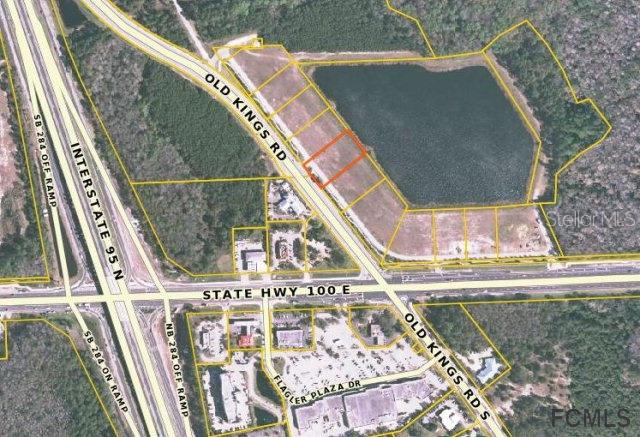 Exceptional pad ready retail site a the intersection of Old Kings Road and SR 100. Kings Pointe Development is a beautifully landscaped ( large lake in the center of property) commercial subdivision on the prime east/west corridor in Palm Coast. This location is just 100 yards from I-95 interchange and is subdivided into 12 prime retail lots. Great drive by visibility with the added feature of a private frontage road offering access from both SR 100 and Old Kings. Please see flyer for detailed demographic information.