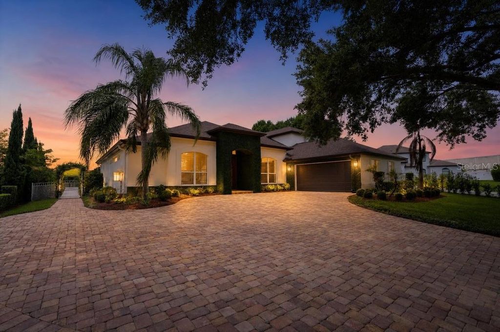 Photo of 7707 Horse Ferry Road, Orlando, FL 32835 (MLS # O6421985)