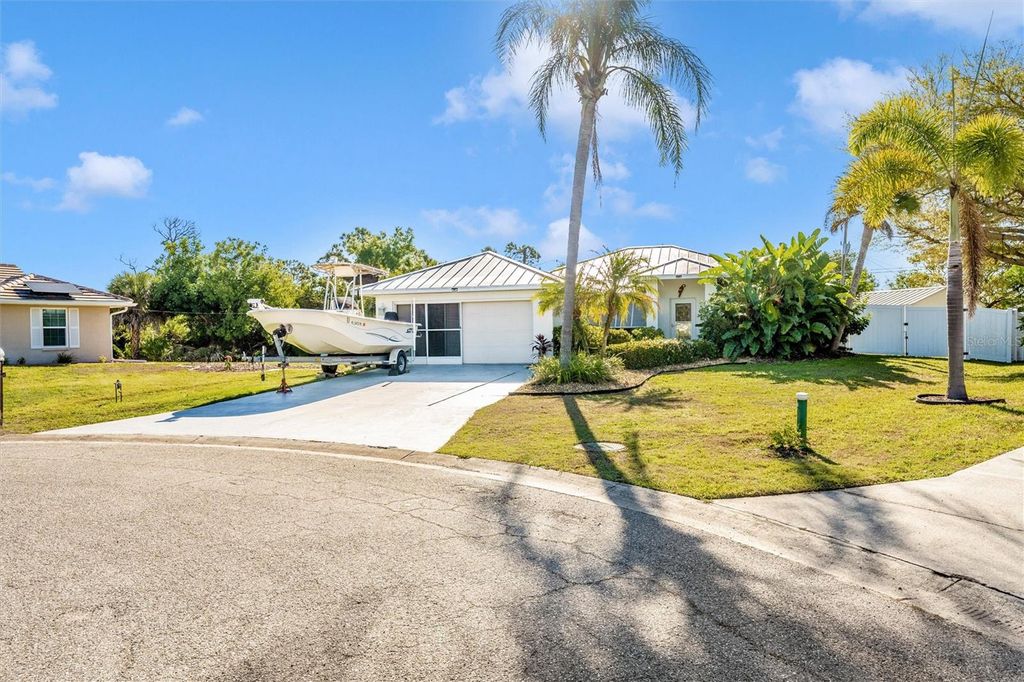 Photo of 125 Englewood Garden Court, Englewood, FL 34223 (MLS # A4687445)