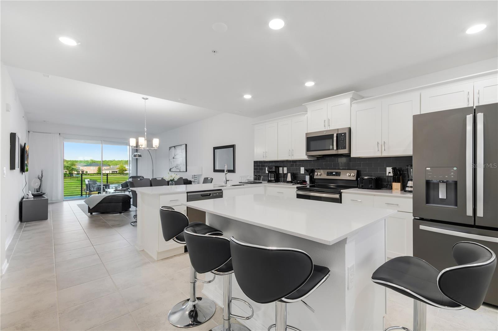 Welcome to this beautifully maintained 2-bedroom, 2.5-bathroom condo located in the sought-after community of Storey Lake in Kissimmee. Situated on the 2nd floor with elevator access, this fully furnished unit features an open-concept layout, modern kitchen with granite countertops, stainless steel appliances, and a spacious balcony. The split-bedroom plan offers privacy and comfort. Storey Lake offers resort-style amenities including a clubhouse, multiple pools, lazy river, splash pad, fitness center, tiki bar, and sports courts. Conveniently located just minutes from Walt Disney World, shopping, dining, and major highways.