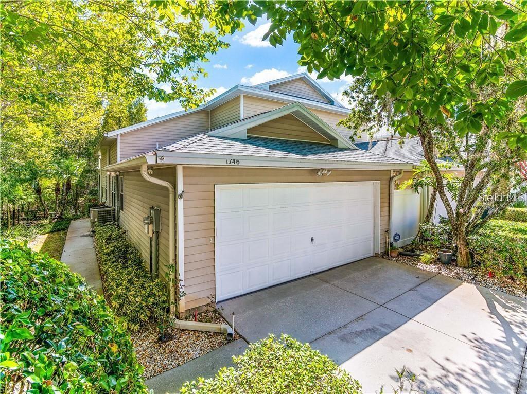 SPECTACULAR MAINTENANCE FREE TOWNHOME! From the minute you walk up to the front door you will fall in love with the nature & conservation views surrounding this well appointed, end unit townhouse. Maintenance free GATED COMMUNITY of Heron Cove that features a tropical pool/spa area, clubhouse, walking paths, serene ponds and access to Bird Lake via floating dock & private boat ramp! Prepare to be amazed as you step inside to the huge, OPEN & BRIGHT great room (w two story high ceiling!) The MASTER SUITE with FULL BATH is ideally located downstairs & boasts a walk in closet, jetted tub, walk in shower & private toilet. UPGRADES: Premium glass panel storm door, touch activated dimmer light switches throughout, central vacuum system with sweep in access on kitchen floor. NEW ROOF in 2020! NEW, new sliding door rollers, grout cleaned & sealed. Garbage paid in taxes. QUIET, PET FRIENDLY Community. Close to Tampa Premium Outlets, Wiregrass Mall, I-275 or Veterans Expressway for easy access to Tampa Airport & bridges to Pinellas County Beaches & more. DON'T DELAY-CALL TODAY! Seller Motivated! Freezer in garage does not convey.