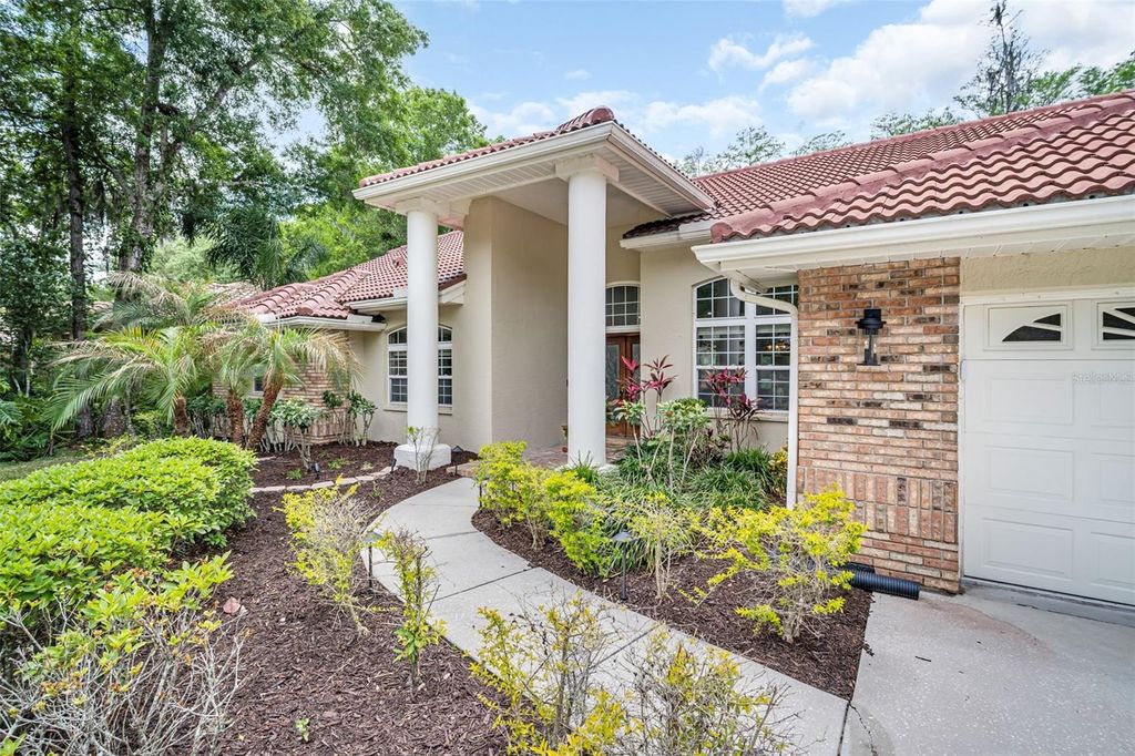 Photo of 1404 East Lake Woodlands Parkway, Oldsmar, FL 34677 (MLS # TB8496474)