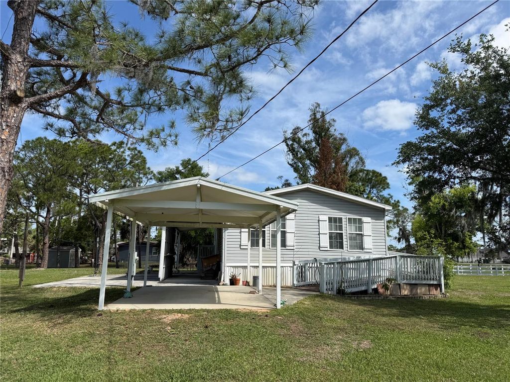 Photo of 4115 Polk City Road, Haines City, FL 33844 (MLS # O6401380)