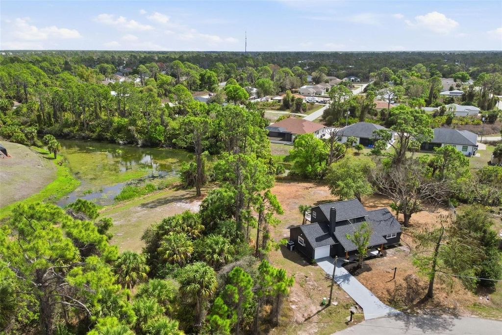 Photo of 1600 Tile Terrace, North Port, FL 34286 (MLS # O6389480)