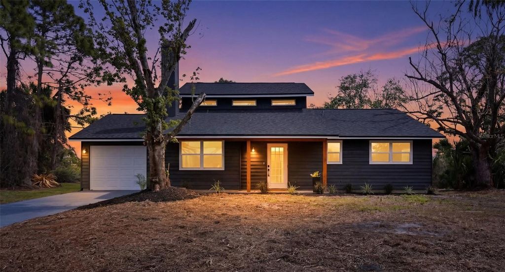 Photo of 1600 Tile Terrace, North Port, FL 34286 (MLS # O6389480)