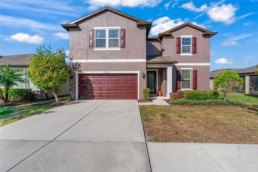 Welcome to 5317 Fallen Leaf Drive, a beautifully appointed 4-bedroom, 2.5 bath, 2,894 sq ft home with an office, loft, and modern upgrades—located in the gated Magnolia Park community of Riverview! Step inside to an inviting open-concept living area highlighted by custom built-ins, creating the perfect space for entertaining or cozy nights at home. Just off the main living space is a convenient half bathroom and a dedicated downstairs office/flex space, ideal for remote work or study. The primary bedroom suite is located on the first floor, offering privacy and comfort. It features a large walk-in closet and a well-designed ensuite bathroom. All additional bedrooms are upstairs, each with large closets for excellent storage. The second floor also boasts a huge loft, offering more than enough space for a media room, playroom, home gym, or additional lounge area. A spacious full bathroom serves the upstairs bedrooms and loft. Enjoy a morning cup of joe or watch the sun rise on the screened in lanai. Modern living just got easier with the 2024-installed EV charger. In the gated Magnolia Park community, residents enjoy pools, playgrounds, walking trails, and easy access to shopping, dining, and major highways. Thoughtfully upgraded, spacious, and move-in ready—this home truly checks every box.