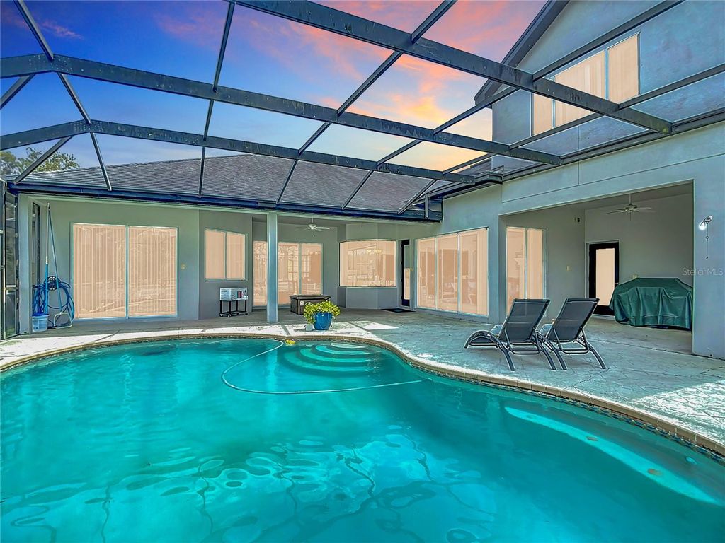 Photo of 12637 Tyler Run Avenue, Odessa, FL 33556 (MLS # TB8396565)