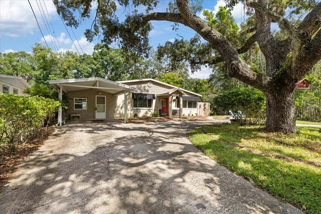 Photo of 12510 Noreast Lake Drive, Tampa, FL 33612 (MLS # TB8530078)