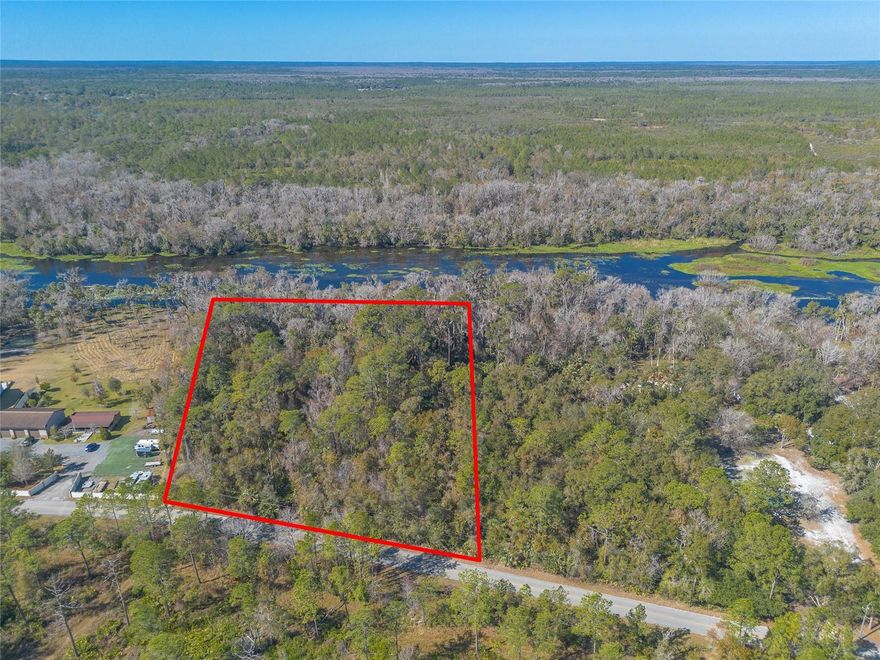 Nestled near the untouched beauty of natural Florida, this rare 3.7-acre parcel offers an extraordinary opportunity to build your dream home along the stunning spring-fed Wekiva River. With 275 feet of river frontage, this once-in-a-lifetime property is a serene retreat surrounded by pristine landscapes and abundant wildlife. Just a half mile from Katie's Landing at the Lower Wekiva River Preserve State Park, you'll enjoy easy access to multiple trailheads, campsites, and the wonders of this federally recognized National Wild and Scenic River. The Wekiva River, one of only two rivers in Florida with this prestigious designation, boasts unpolluted waters, natural shorelines, and a connection to Central Florida's rich network of lakes, rivers, and springs. Conveniently located just 7 minutes from I-4 and 10 minutes from Sanford, this property provides the perfect blend of peace and tranquility with modern conveniences. With the recently completed State Road 29, you'll enjoy effortless access to all that Central Florida has to offer. The owner previously planned to subdivide this property, along with the neighboring lot (also available), into three lots for 6,000-square-foot homesteads, presenting incredible development potential. Whether you're looking to create a private riverfront estate or invest in a unique opportunity, this property is truly a special place that captures the essence of Florida's natural charm.
