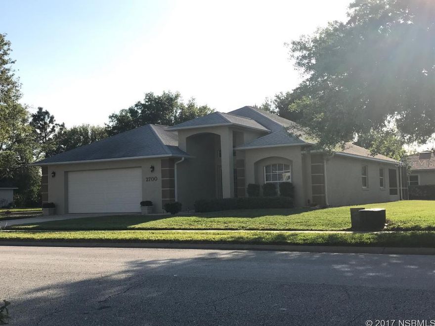 3/2 Johnson built stucco block home. This  model has an open floor plan,and a safe room, A spacious lanai, a full galley kitchen and flexible 3rd bedroom or Den which makes this Turnbull Bay home one you don't want to miss.  Large tiled shower and over sized garden jet tub complete this en suite bath. Home includes a large over sized garage and private location in New Smyrna Beach's best golf course subdivision. ;Water: City