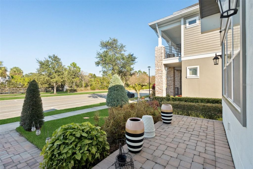 Photo of 9526 Tavistock Lakes Boulevard, Orlando, FL 32827 (MLS # O6364140)