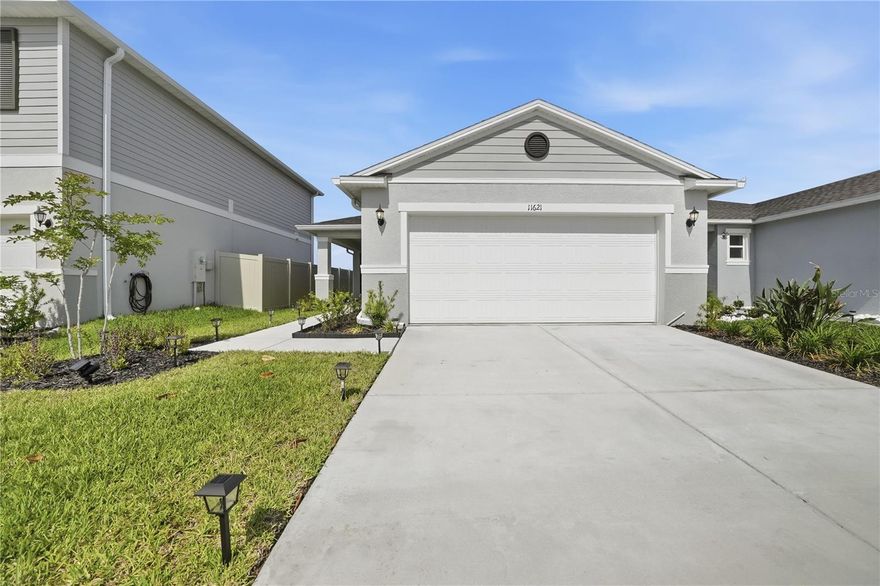 Welcome to Magnolia Creek, where modern comfort meets everyday convenience. This beautifully completed single story home features an open and functional layout with volume ceilings, upgraded tile flooring throughout the main living areas, and a spacious covered patio perfect for relaxing or entertaining outdoors.
The kitchen is designed to impress with 36 inch upper cabinets, stainless steel Whirlpool appliances, laminate countertops, a large island with breakfast bar seating, and seamless flow into the spacious great room. The split bedroom floorplan provides added privacy, while the primary suite features an oversized walk in closet, dual sink vanity, linen closet, and walk in shower with tile surround.
Three additional bedrooms provide flexibility for guests, a home office, fitness space, or hobbies, along with a dedicated laundry room and second full bathroom. Located in the desirable Magnolia Creek community with no CDD fees and convenient access to I 75, US 301, and US 41, this home is close to shopping, dining, schools, and everything the growing Riverview area has to provide. Move in ready and waiting for its next owner.