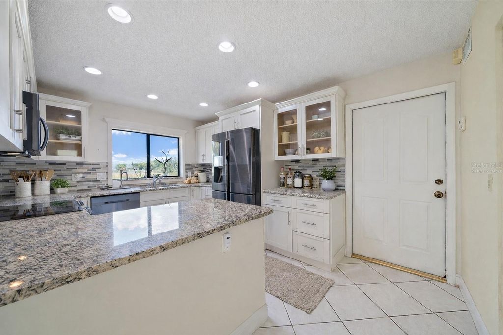 Photo of 603 Speck Court, Tampa, FL 33613 (MLS # A4685971)