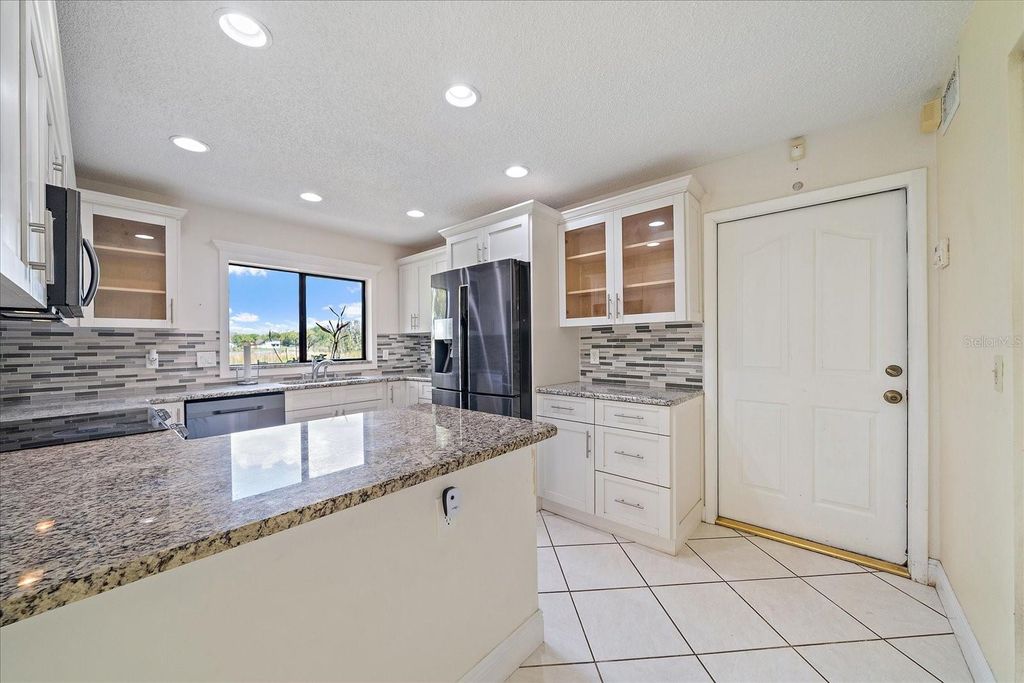 Photo of 603 Speck Court, Tampa, FL 33613 (MLS # A4685971)