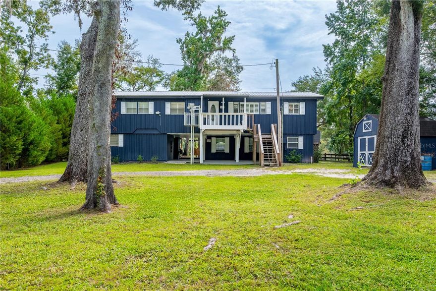 Welcome to your Suwannee River getaway!
This beautifully updated 3BR/2BA home sits right on the water and includes a separate 2BR/1BA furnished apartment below perfect for a mother-in-law suite, guests, or extended family to enjoy their own space.
Inside, you’ll find a remodeled kitchen, new flooring, and an updated guest bath, all combining to create a space that’s warm, inviting, and designed for comfort. Step out onto the expansive screened porch overlooking the river—the ultimate spot to sip morning coffee, unwind with a good book, or catch a breathtaking sunset. Entertain with ease on the deck and patio, ideal for summer barbecues and gatherings.
Life on the water is effortless here. Canoe, kayak, or boat along the Suwannee River, and explore the nearby natural springs. The property features its own covered boat dock, giving you a safe, convenient place to keep your boat ready for adventure at a moment’s notice. A newly installed elevator makes moving between levels convenient and comfortable, adding both value and accessibility to this unique riverfront property.
This home is being sold fully furnished, making it truly move-in ready. Whether you’re searching for a vacation home, investment property, or year-round riverfront retreat, this home has it all. With its prime location, versatile layout, and sought after amenities, it would also make a fantastic Airbnb.
Don’t miss your chance to own this one-of-a-kind furnished Suwannee River treasure!