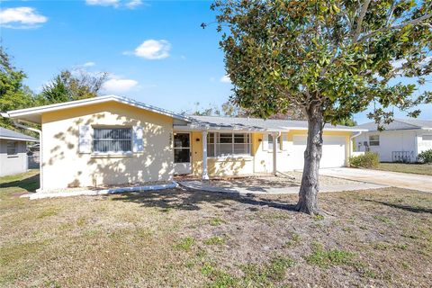 Photo of 2481 12th Avenue SW, Largo, FL 33770 (MLS # TB8469441)