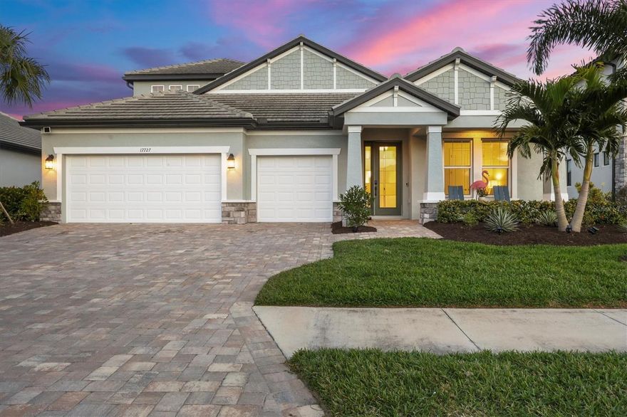 This stunning custom four-bedroom residence with a private office and expansive bonus room in the Sweetwater neighborhood of Lakewood Ranch represents an exceptional blend of refined design, thoughtful upgrades and effortless Florida living. Every element of the home has been carefully curated to balance beauty with function, creating a residence that feels elevated and warmly inviting. Upon entering through the custom hurricane-rated glass panel front door, you are welcomed into a thoughtfully designed floor plan featuring three bedrooms conveniently on the main level, along with a private office framed by elegant double doors, ideal for working from home or creating a quiet retreat. Throughout the home, custom architectural wall and ceiling details, designer lighting and fine finishes reflect a level of craftsmanship and timeless sophistication rarely found. At the heart of the home, the main living areas flow seamlessly, offering an inviting setting for everyday comfort and gracious entertaining. The chef’s kitchen is beautifully appointed with upgraded appliances, beautiful cabinetry and a custom-designed pantry, thoughtfully created to satisfy even the most discerning home chefs. The oversized primary suite serves as a serene sanctuary, offering generous proportions, custom-designed closets and a stunning spa-inspired en-suite bath with upscale finishes that elevate daily routines into moments of indulgence. Upstairs, a generously sized bonus room provides space for hosting guests or creating a secondary living area, complete with a dry bar and ample storage. This level also includes a spacious bedroom with a built-in desk area, walk-in closet and en-suite bath, offering comfort and privacy for guests or family members. Outdoor living is equally impressive. The expansive lanai is designed for year-round enjoyment and entertaining, featuring a fully equipped outdoor kitchen, a large resort-style pool accented by beautiful leathered pavers, and a custom built-in spa, all set within a private, beautifully landscaped setting. Modern conveniences enhance peace of mind and future-ready living, including a generator hookup, an EV charger and a whole-house water purifier and softener system, providing comfort, efficiency and quality throughout. In Sweetwater at Lakewood Ranch, residents enjoy proximity to world-class amenities, exceptional dining and shopping, top-rated schools and the lifestyle that has made Lakewood Ranch one of the desirable communities in Florida. This is a rare opportunity to own a home where architectural detail, modern luxury and an exceptional location come together seamlessly.