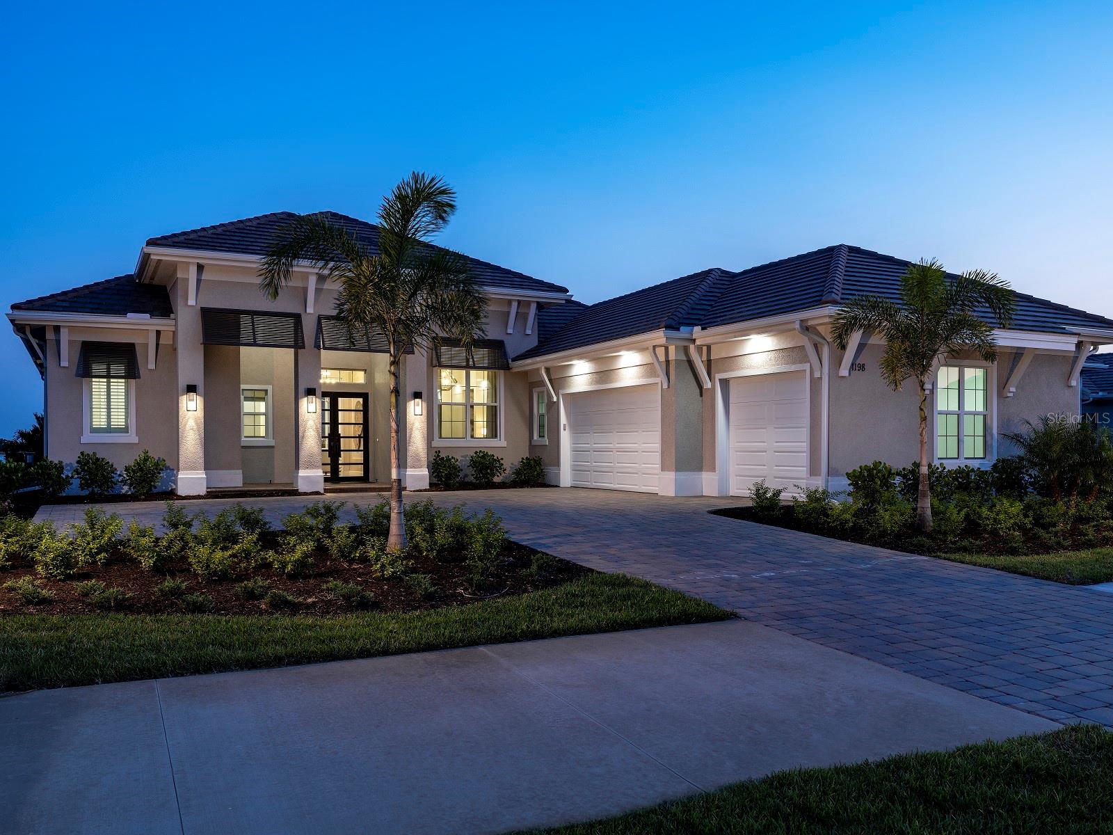 Welcome to Wild Blue at Waterside, where luxury coastal living meets natural beauty. Stock Luxury Homes presents an exquisite blend of timeless architecture, semi-custom details, and expansive open spaces. This stunning CHANDLER Model Home features 3 bedrooms, 4.5 bathrooms, a spacious Great Room, Dining area, a dedicated Study, and a versatile Bonus Room. Enjoy seamless indoor-outdoor living with a generously sized outdoor space complete with a pool and spa, plus a 3-car garage. This MODEL HOME is being sold with Leaseback terms through January/February of 2026. This Quick Close Sales Price includes the furniture and Decor package!