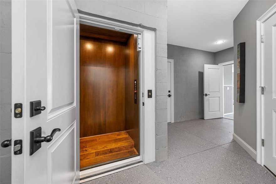 Stunning Waterfront Oasis in St Petersburg Florida.    Discover your dream home on open water in beautiful St Petersburg.   This exquisite 4-bedroom, 4.5 bathroom residence boasts 4010 heated square feet of luxurious living space, perfect for both relaxation and entertaining.  
 There’s also an office that could be used as a fifth bedroom if required. The home has a handicap accessible elevator to all floors.  Built in 2018 this modern gem features high end finishes and  an open floor plan that seamlessly blends indoor and outdoor living.   Enjoy breathtaking water views from multiple vantage points, including a spacious living area that flows into a gourmet kitchen with two islands and top of the line appliances.   The master suite is a true retreat, complete with a spa like en-suite bathroom and ample walk in closet space.   Then you step outside to your private outdoor paradise, where you can unwind by the shimmering water, host gatherings, or simply soak in the stunning sunshine.   With its prime location, you’ll have easy access to local dining spots, shopping and the vibrant culture of St. Petersburg.   This home is built like a fortress, with concrete block and rebar in all the exterior walls.