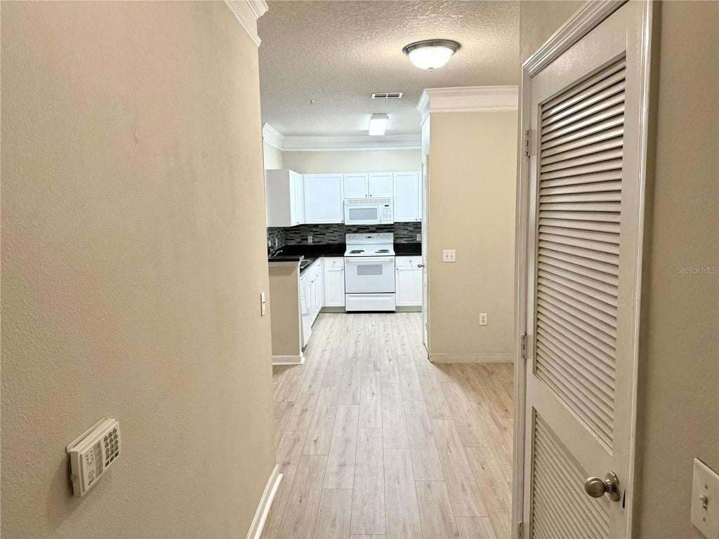 Photo of 8842 Villa View Circle #307, Orlando, FL 32821 (MLS # O6438772)