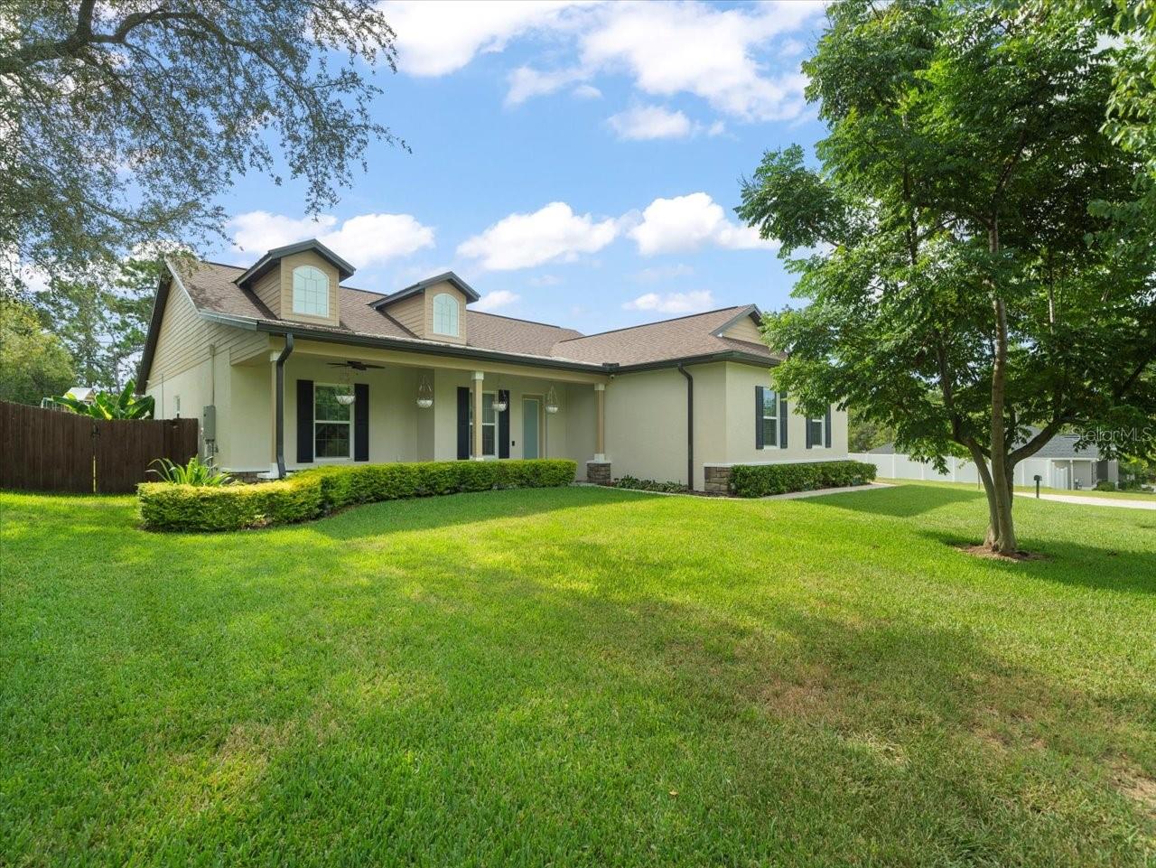 Hunny Stop the car! Check out this Beautiful Well-Loved 1 Off Custom home! Built in 2020 Located in the Royal Highlands! This property is a true turnkey move in ready POOL home! With a open floor plan, gorgeous ''in-ground saltwater pool'' and generous size pool deck on a corner lot this is the perfect setup for Family and Entertaining! This home needs nothing and boasts many upgrades, such as a Propane Powered whole house ''Generac System''! Perfect for the annual storm season! Gas stove for the Chef of the family that loves to cook! Fully fenced yard with a irrigated garden, a playground, lovely pavers with a retaining wall, huge gazebo for more covered seating, beautiful trees planted in the front and a yard covered in bright green well cared for St, Augustine grass! Curb appeal, this house has it! Not to mention the cozy inviting front porch! With the sun setting in the back, it makes for a great sunset while relaxing in the pool! Such a well thought out interior layout, you'll find a Spacious Kitchen with lots of Cabinet & Counter space! Custom multi-level cabinets, granite counter tops throughout the kitchen and bathrooms, stainless steel appliances, generous sized island and a breakfast bar! Inside utility room with lots of storage! The primary bedroom is perfect sized with a decorative ship lab boarding around and into the bathroom, The bathrooms are tiled with a lovely natural tone tile and the floors are covered with LPV throughout! ''NO CARPET!'' If you're looking for a pool home with ''NO HOA and NO FLOOD ZONE ''this is a must see! This is that farmhouse style living but not too far from all the action in town! Schedule your tour today!
