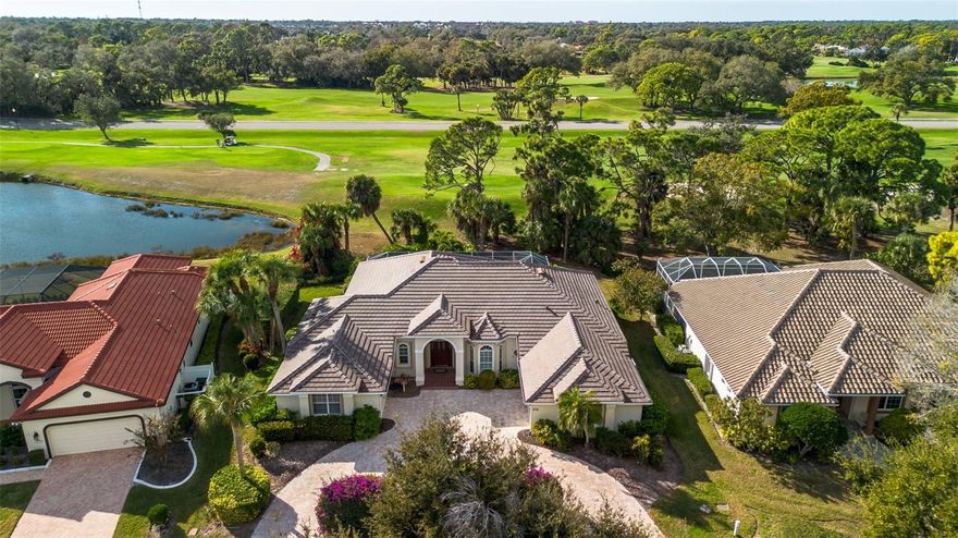 Welcome to refined Florida living in the heart of Calusa Lakes, where timeless craftsmanship, thoughtful exterior improvements, and tranquil golf-course views come together in perfect harmony. This custom-built residence offering approximately 2,700 square feet under air is designed for both everyday comfort and effortless entertaining, beautifully positioned along the 18th fairway.
Inside, the home offers three generously sized bedrooms, two well-appointed bathrooms, and a versatile den/office featuring custom built-in cabinetry—ideal for working from home or creating a private retreat. The open-concept floor plan seamlessly connects the spacious kitchen, living, and dining areas, enhanced by abundant storage and natural light, making the home equally suited for intimate evenings or larger gatherings.

The primary suite serves as a true sanctuary, offering ample space and serene views of the landscaped grounds and golf course beyond. An oversized laundry complete with extensive storage, and a separate utility room provides flexibility that could easily be reimagined as an exercise or hobby room.

Outdoor living is elevated by a paver-brick screened lanai, where expansive fairway views create a peaceful backdrop for morning coffee or sunset entertaining. Recent upgrades provide peace of mind and lasting value, including a new roof, paver driveway, and permanently installed hurricane shutters.

The home is located within Calusa Lakes Golf Club, a gated golf community nestled within 480 wooded acres, featuring over 20 scenic ponds and 575 custom-built homes. Residents enjoy an 18-hole championship golf course, clubhouse with dining, four Har-Tru tennis courts, low HOA fees, and no CDD fees. Golf membership is optional, not mandatory, offering flexibility rarely found in golf-course communities. The location is ideal—just minutes to the Legacy Trail and only two stoplights to Nokomis Beach.

This exceptional property offers the perfect blend of privacy, quality construction, thoughtful upgrades, and an unmatched Nokomis lifestyle—where nature, convenience, and elegance meet.
