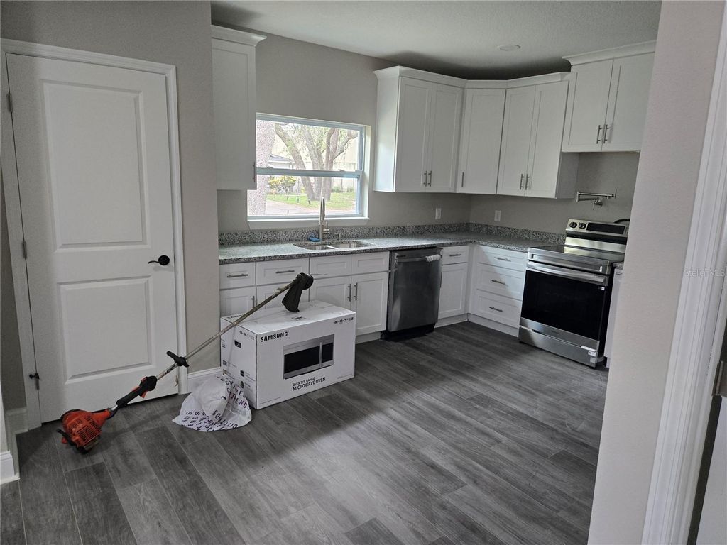 Photo of 704 E Orchid Avenue, Tampa, FL 33612 (MLS # TB8521660)