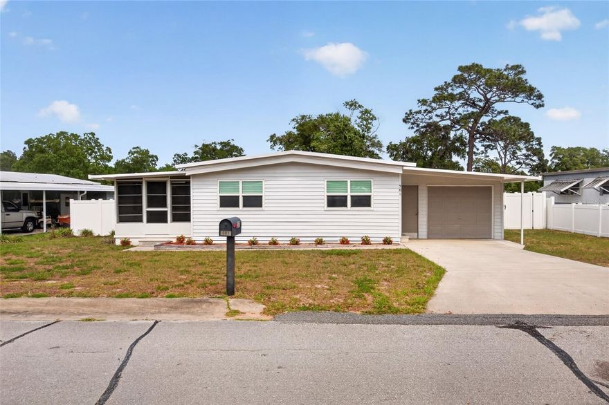 One or more photo(s) has been virtually staged. Move-In Ready 2 Bedroom Mobile Home Near Ocala
Neat, tidy, and truly move-in ready, this charming 2 bedroom, 1 bath mobile home offers comfort, convenience, and a peaceful Florida lifestyle. With a large Florida room, an open deck, and a fully fenced yard, this property is ideal for anyone seeking an easy-to-maintain home close to nature and city amenities.Property Highlights
2 Bedroom Layout — Cozy, functional, and easy to maintain

1 Full Bath — Clean and well-kept

Large Florida Room — Perfect for relaxing, hobbies, or extra living space

Open Deck — Great for morning coffee or evening gatherings

Fully Fenced Yard — Ideal for pets, privacy, and outdoor enjoyment

One-Car Garage — Rare for this style of home

Convenient Location — Minutes to Ocala, yet a short drive to the Ocala National Forest for camping, kayaking, canoeing, and fishing

This home offers the best of both worlds—close to the city, but with quick access to some of Florida’s most beautiful natural areas. Whether you enjoy outdoor recreation or want a peaceful place to call home, this property delivers. 

HOA of $150 per month - Community offers pool, clubhouse, library, workout room, shuffleboard, monthly activities. Also includes water, sewer, trash and recycle pickup. If available a space in the RV lot can be obtained for an additional 1 time fee.
