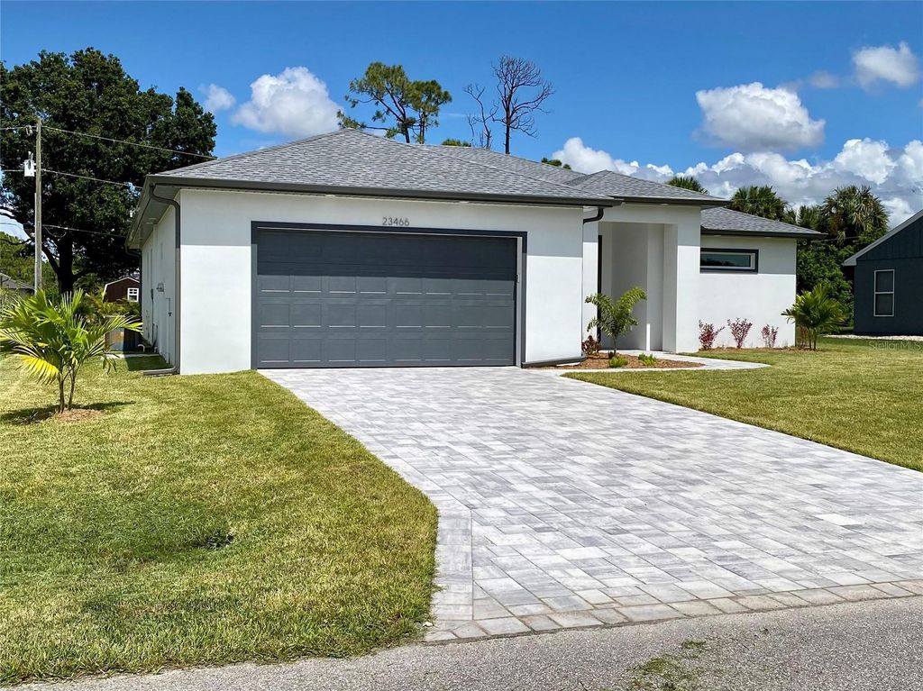 Photo of 23466 Garrett Avenue, Port Charlotte, FL 33954 (MLS # R4910927)