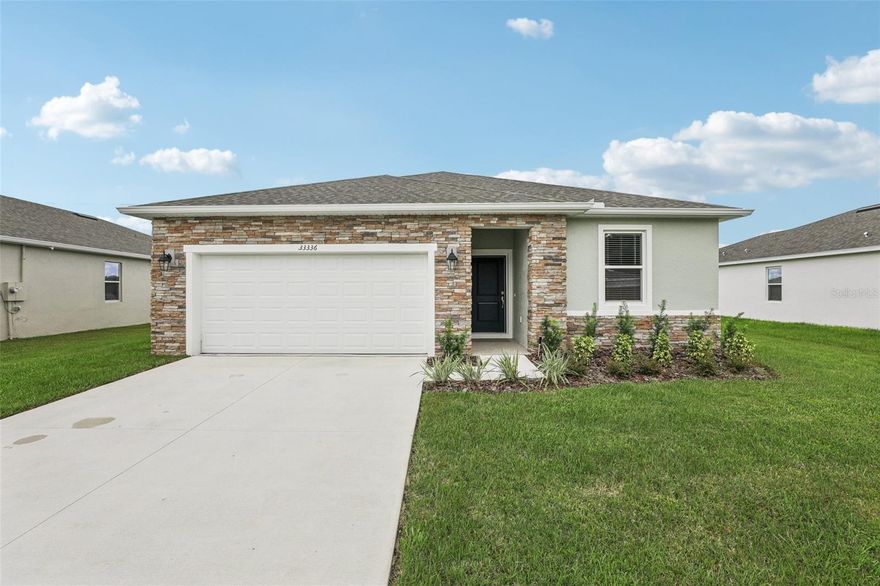 ASSUMABLE FHA FINANCING AVAI8LABLE AT A GOOD RATE. Welcome to this inviting 3-bedroom, 2-bath home designed with an open concept that feels airy and connected. The kitchen is a standout with stone countertops, stainless appliances, and a spacious pantry—perfect for everyday living or entertaining. The private ensuite features dual vanities and a generous walk-in closet, while the split floor plan offers two additional bedrooms on the opposite side of the home. Step outside to a covered lanai for year-round relaxation. The neighborhood adds to the lifestyle with a brand-new pool and playground just moments away. Schedule your tour today!