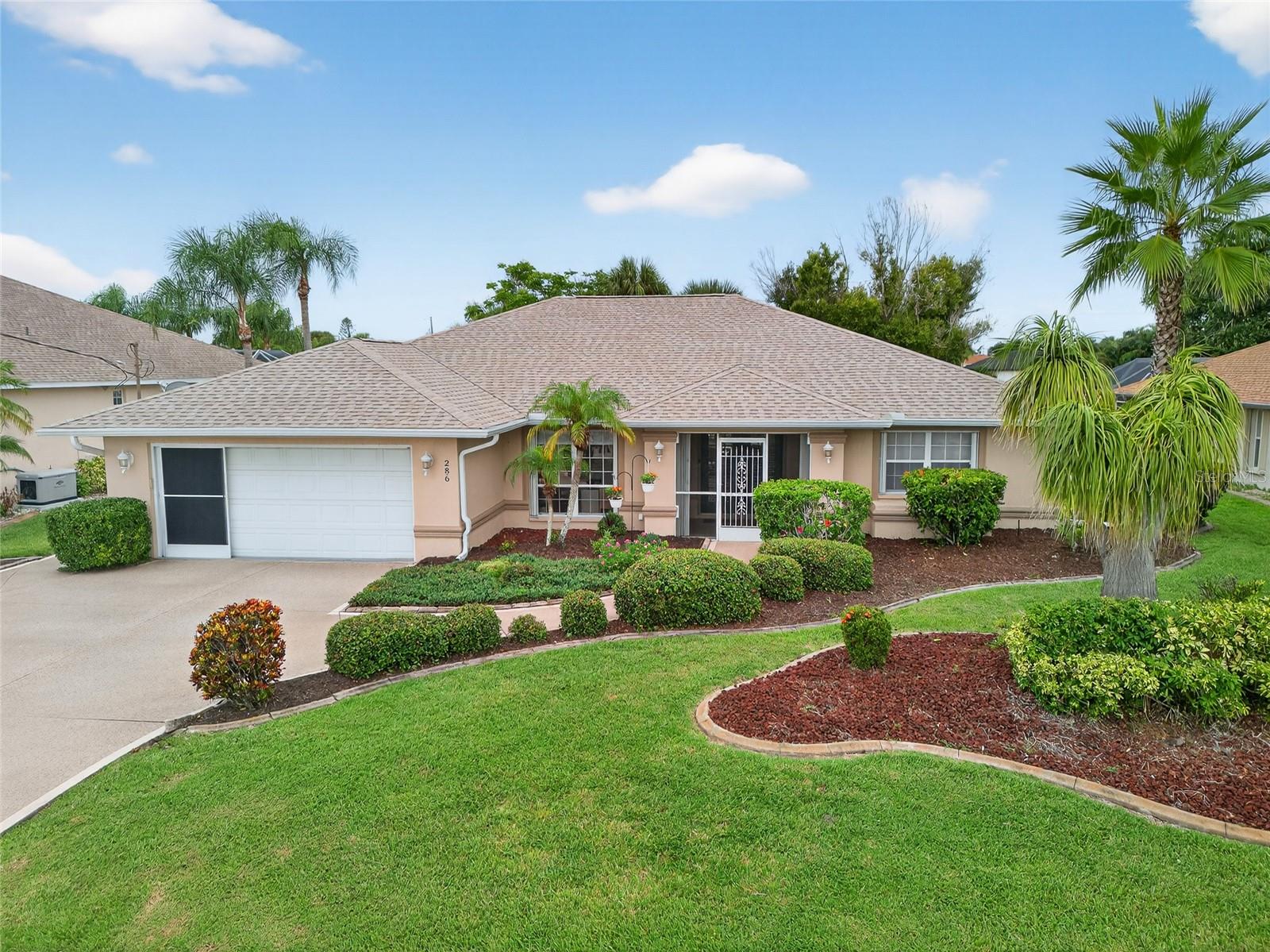 METICULOUSLY MAINTAINED 3 BEDROOM, 2 BATH, 2-CAR GARAGE POOL HOME LOCATED IN HIGHLY SOUGHT AFTER PINEHURST COMMUNITY IN ROTONDA WEST! Newer roof and pool cage installed in 2023 and 2024 automatic standby generator w/ propane tank provides peace of mind. Mature and lush landscaping. Inviting open floor plan features over 1,900 square feet of living area, double door entry, high ceilings, ample natural lighting, and multiple sliders throughout. Step inside to living area with views of the lanai and pool area. The kitchen features white cabinetry with quartz countertops, tile backsplash, breakfast bar, and access to lanai and pool perfect for entertaining. Generous primary bedroom boasts sitting area, walk-in closet, access to pool and ensuite bath with walk-in shower, soaker tub and dual sinks. Split floor plan provides guests with plenty of privacy with 2 additional bedrooms and full guest bath. Outside entertaining area features covered lanai, screened and heated pool with waterfall. Additional features include inside laundry room with cabinetry, irrigation system from canal, pool bath, and outdoor shower. Rotonda West is a quiet community with friendly neighbors, and this home won't last long! You'll find world-class fishing at Boca Grande, numerous golf courses close by, sandy beaches, beautiful parks, boating and a wide variety of dining and shopping! Don't miss this opportunity! Schedule your private showing today!