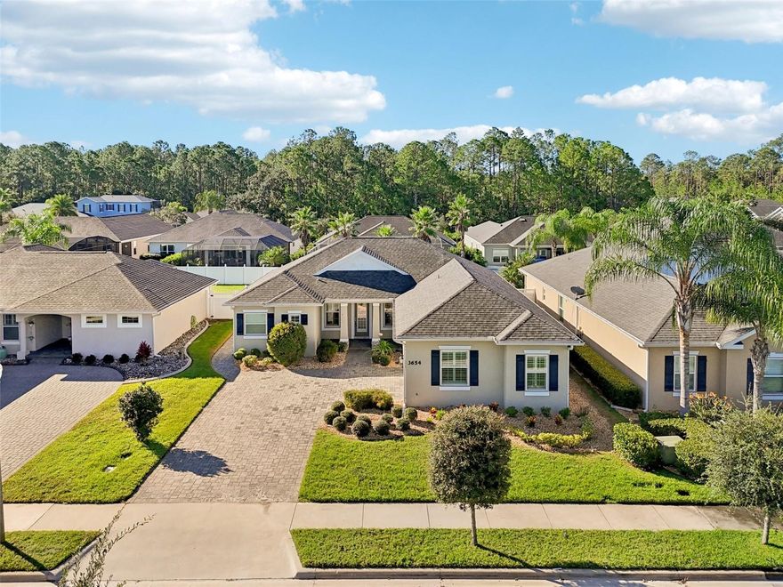 Welcome to 3654 Pini Avenue, located in the Arbour Lakes community in Venetian Bay. Built in 2016 by Platinum Builders, this beautifully maintained single-story concrete block home offers 3 bedrooms, 2 full bathrooms, and 1,859 square feet of living space. The open floor plan features tile and new luxury vinyl flooring throughout, creating a warm and inviting atmosphere. The kitchen flows seamlessly into the living and dining areas, ideal for entertaining. The spacious primary suite includes a luxurious en suite bathroom with dual vanities, a soaking tub, and a walk-in shower. Step outside to your private backyard oasis with a sparkling in-ground pool, screened lanai, and paver patio; perfect for enjoying Florida’s sunshine year-round. Additional highlights include fresh interior paint, a dedicated laundry room, and a large driveway. Constructed with durable concrete block, roof with asphalt shingles, and forced ducted electric heating and cooling, this home blends quality craftsmanship with modern comfort. Located close to beaches, golf, shopping, dining, and schools, this move-in-ready home is a must-see.