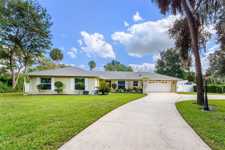 Welcome to 496 Mead Drive, an exquisite haven of tranquility nestled in the heart of Oviedo, Florida. This meticulously designed 4-bedroom, 2-bathroom pool home is a true gem, offering an irresistible blend of modern comfort and timeless charm. With an address that promises a lifestyle of convenience, this property boasts an array of desirable features that make it a captivating choice for anyone seeking the ultimate in Florida living.
As you arrive, you'll be instantly captivated by the curb appeal. The front yard is a lush paradise of greenery and colorful blooms, boasting impeccable landscaping that welcomes you home with open arms.
Step inside, and you'll be greeted by a warm and inviting living space filled with an abundance of natural light. The open floor plan effortlessly blends the living room, dining area, and kitchen, creating a seamless flow perfect for both entertaining and everyday living. With its gleaming tile and wood laminate floors in a neutral color palette, this home exudes a feeling of timeless elegance and versatility.
The heart of the home is undoubtedly the well-appointed kitchen. Boasting granite countertops, and countless wood cabinets. Prepping your favorite meals has never been easier. The kitchen effortlessly flows to the living area, ensuring that you can entertain friends and family with ease.
Sliding glass doors lead you to a backyard paradise that feels like an extension of your living space. The covered lanai overlooks a sparkling, screen enclosed pool, where you can take a refreshing dip on warm Florida afternoons or simply bask in the sun while enjoying a good book. The fully fenced backyard ensures privacy and provides ample space for outdoor gatherings, barbecues, and gardening. In addition, whether you are looking for the perfect ‘she-shed’, or hobbyist’s workshop, this home has it!
The master suite is a private retreat that offers a peaceful sanctuary. Featuring two closets and an en-suite bathroom with dual vanities. It's the perfect escape after a long day. The three additional bedrooms are spacious, bright, and offer a beautiful pool view. 
496 Mead Drive also includes a two-car garage, an indoor laundry room, and a meticulously maintained lawn. The location is truly unbeatable, with convenient access to Oviedo's top-rated schools, shopping, dining, and major roadways for an easy commute to Orlando and beyond.