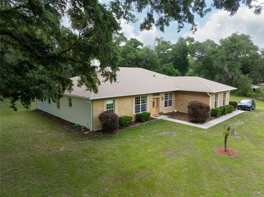 Welcome to your peaceful slice of country heaven! Original owner and well-maintained! This tucked away on 2.5 acres on a quiet dead-end road, this spacious 2007 block-and-brick home offers the perfect blend of privacy, comfort, and room to breathe. With A-3 zoning, no flood zone, a 2023 roof and gutters, and a new drainfield installed in 2019, this property is ready for its next owner to enjoy.

Step inside through the large, inviting foyer, where you are greeted by a bright, open-concept floor plan with 10-foot ceilings throughout, double-pane windows, and no carpet. Offering 2,318 square feet, this home features 3 bedrooms, a large office/den, an inviting game room, a spacious formal dining room, and a large walk-in storage room. The spacious family room is warm and welcoming with a fireplace and heat blower, creating the perfect place to gather on cooler evenings.

The kitchen is open and functional with granite countertops, with a breakfast bar, a pantry, and plenty of space for entertaining. The game room adds extra flexibility, and the pool table conveys, making it ready for fun from day one. A convenient half bath leads out to the oversized covered back patio, where you can relax, unwind, and enjoy the peaceful backyard views.

The large and bright primary suite offers private backyard access and a beautiful ensuite bath with a tiled walk-in shower, dual vanities, a makeup vanity, and plenty of shelving for towels and linens. Guest bedroom one is spacious and full of natural light, complete with both a double closet and a single closet. Guest bedroom two is also bright and comfortable with a double closet.

Additional features include an interior laundry room, a 2-car garage, formal dining space, and plenty of storage throughout. Outside, the 2.5-acre setting gives kids and grandkids room to run free, play, explore, and enjoy the simple beauty of country living.

Peaceful, private, and full of charm, this property is the perfect place to slow down, spread out, and truly feel at home.
 Please note that all information and measurements are provided for accuracy, but are not guaranteed to be accurate. Buyers and their agents should verify all property details, including zoning, schools, HOA rules, pet policies, and other potential uses.