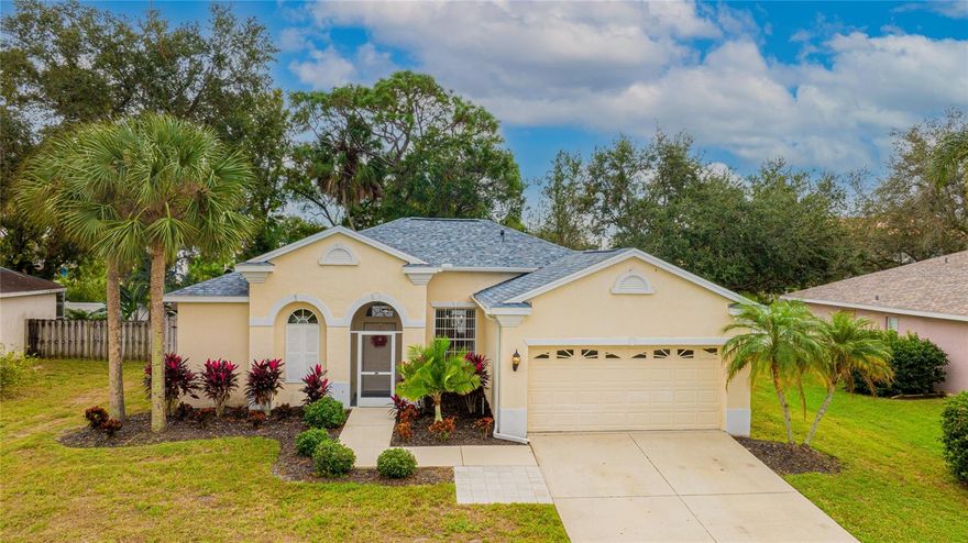 Come see this lovely River Pointe 3-bedroom, 2-bath POOL home that has been impeccably maintained and is awaiting its new owners! Comfortably live in 1550 sf of living area with a split plan featuring a Living and Dining Room, Breakfast Nook and the air-conditioned convenience of an indoor Laundry Room. Water views are everywhere! Enter the caged screened door entry — perfect for cooler nights and fresh air — through the foyer and see the sparkling swimming pool surrounded by a private fenced in backyard. A small lake is positioned right across the the street so that you can enjoy more water views of the ducks, egrets, and natural Florida waterfowl with the added privacy of no neighbors in front. Picture yourself preparing meals in your kitchen featuring newer stainless steel upgraded Kitchen-Aid appliances, solid wood cabinets, canister lighting, gorgeous granite countertops, a walk-in pantry closet and a barstool breakfast counter area. Entertaining will be a pleasure as family and friends relax and sunbathe in the pool. The Primary Retreat includes an ensuite bathroom and a LARGE walk-in closet, with a new sliding glass door for pool and patio access. Extras include PVC and wood fencing, 1-year-old interior and exterior painted, blinds,  textured volume ceilings, tile and laminate flooring, 2022 roof, 2023 water heater, lamp post lighting, hurricane-rated windows and a hurricane enforced roof. This home also boasts the additional luxury of being elevated. Add to all of this ...   and you even have the bonus of walking distance to a private community neighborhood boat ramp. Pet-friendly with no CDD taxes and low HOA fees of $50 month.  Don't miss this one—it will go fast!