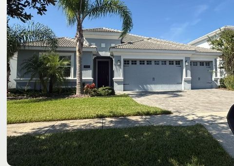 Photo of 1488 Olympic Club Boulevard, Champions Gate, FL 33896 (MLS # S5134634)
