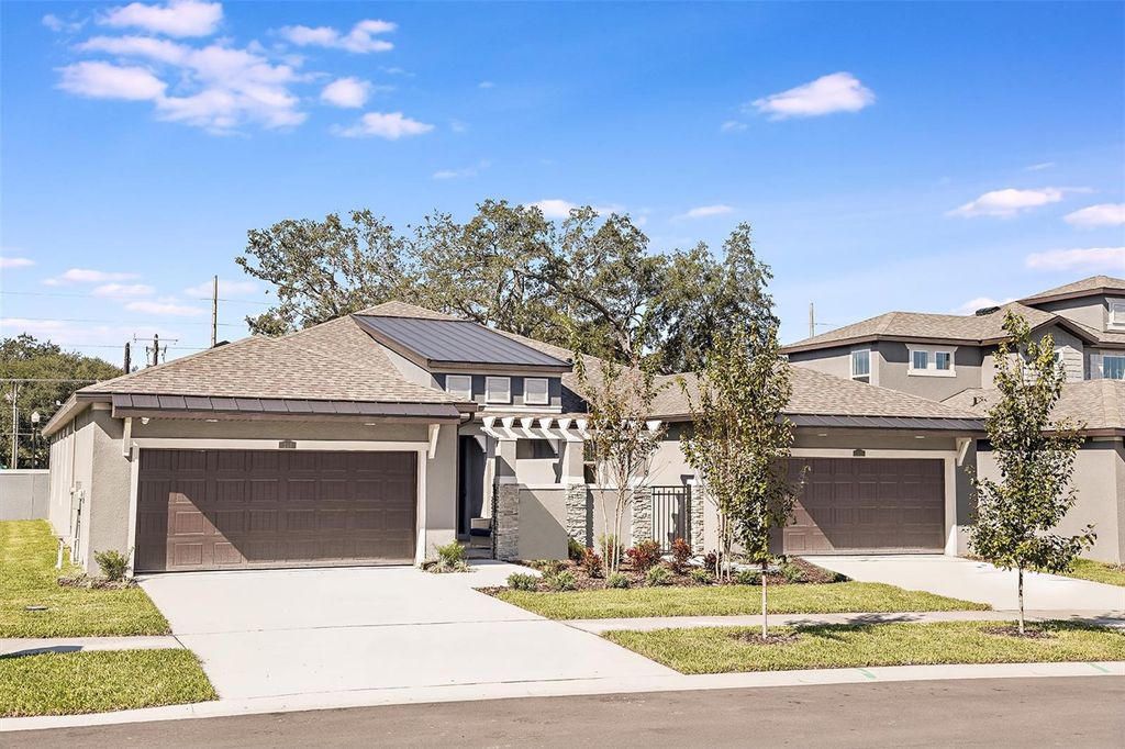 Photo of 210 Villa Luna Lane, Lutz, FL 33549 (MLS # TB8430499)