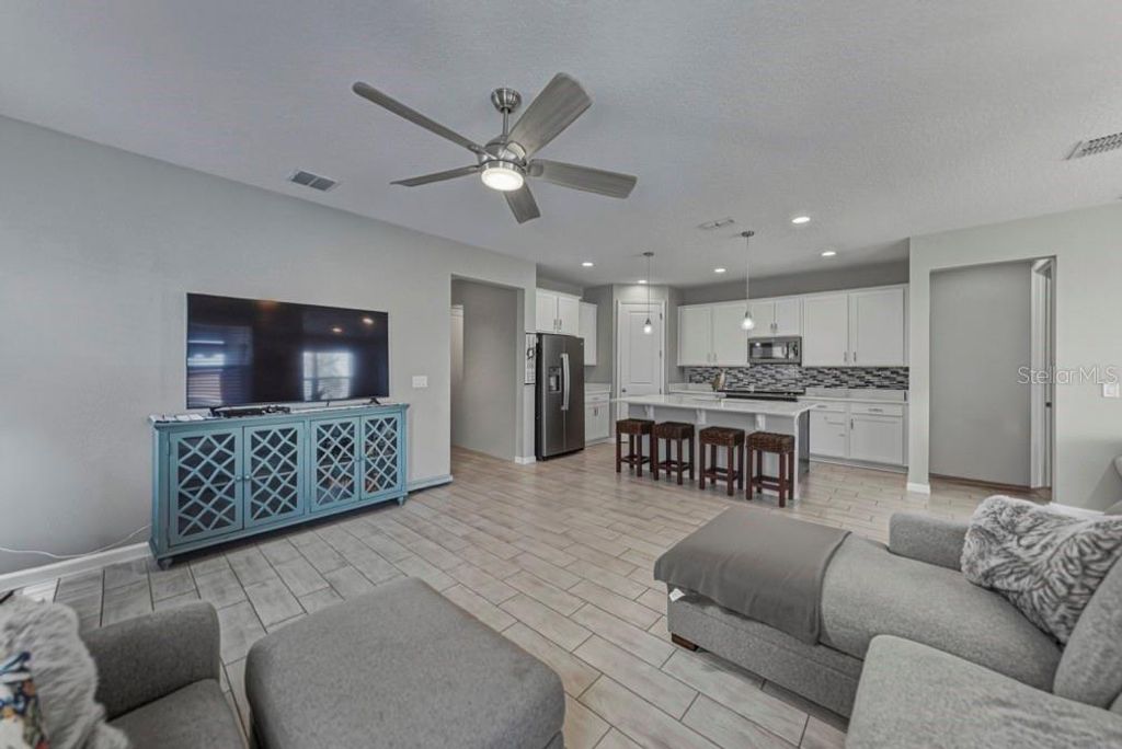 Photo of 295 Lake Smart Circle, Winter Haven, FL 33881 (MLS # TB8442058)